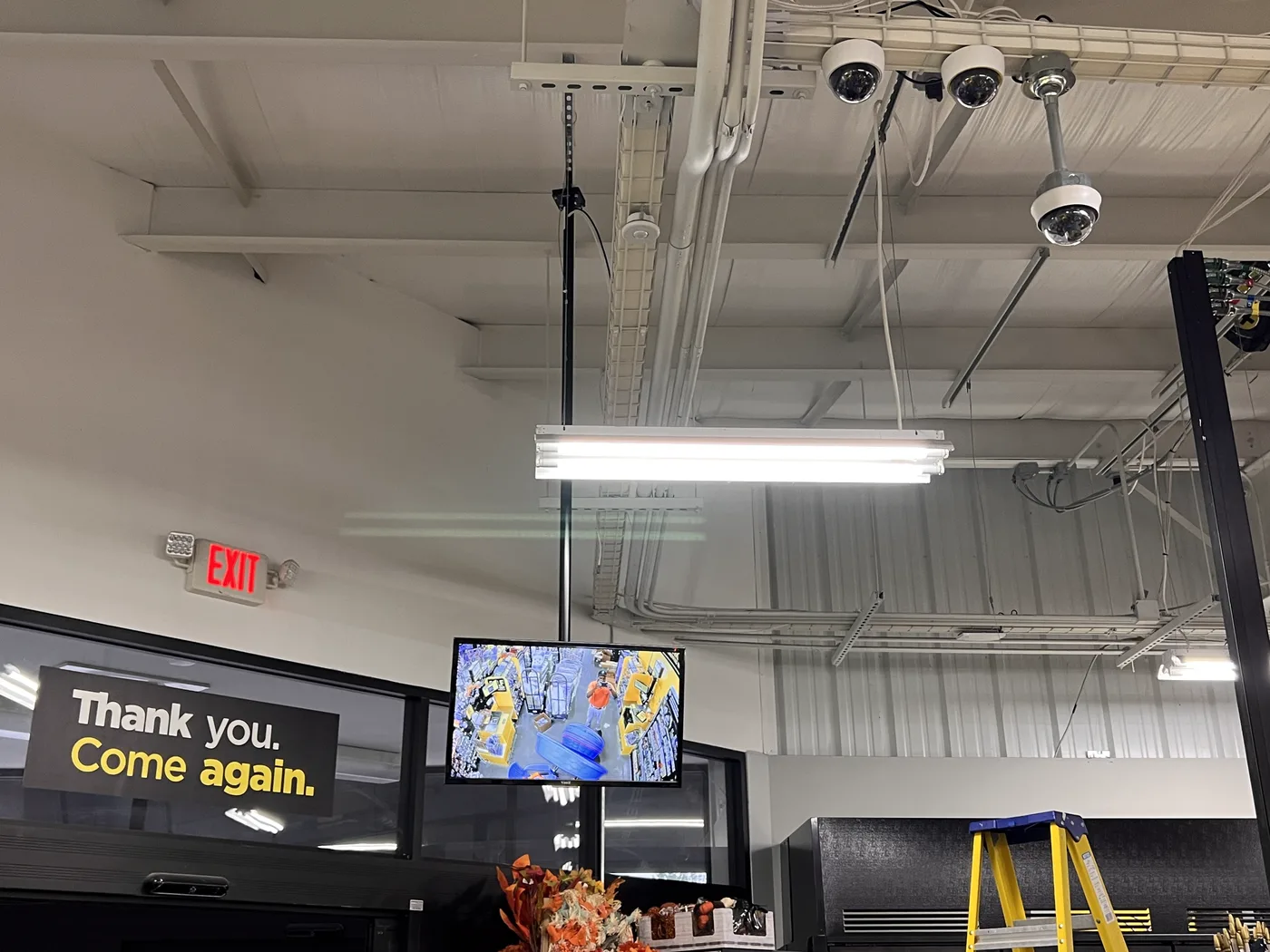 Ceiling dome security cameras installed in a Maine retail store