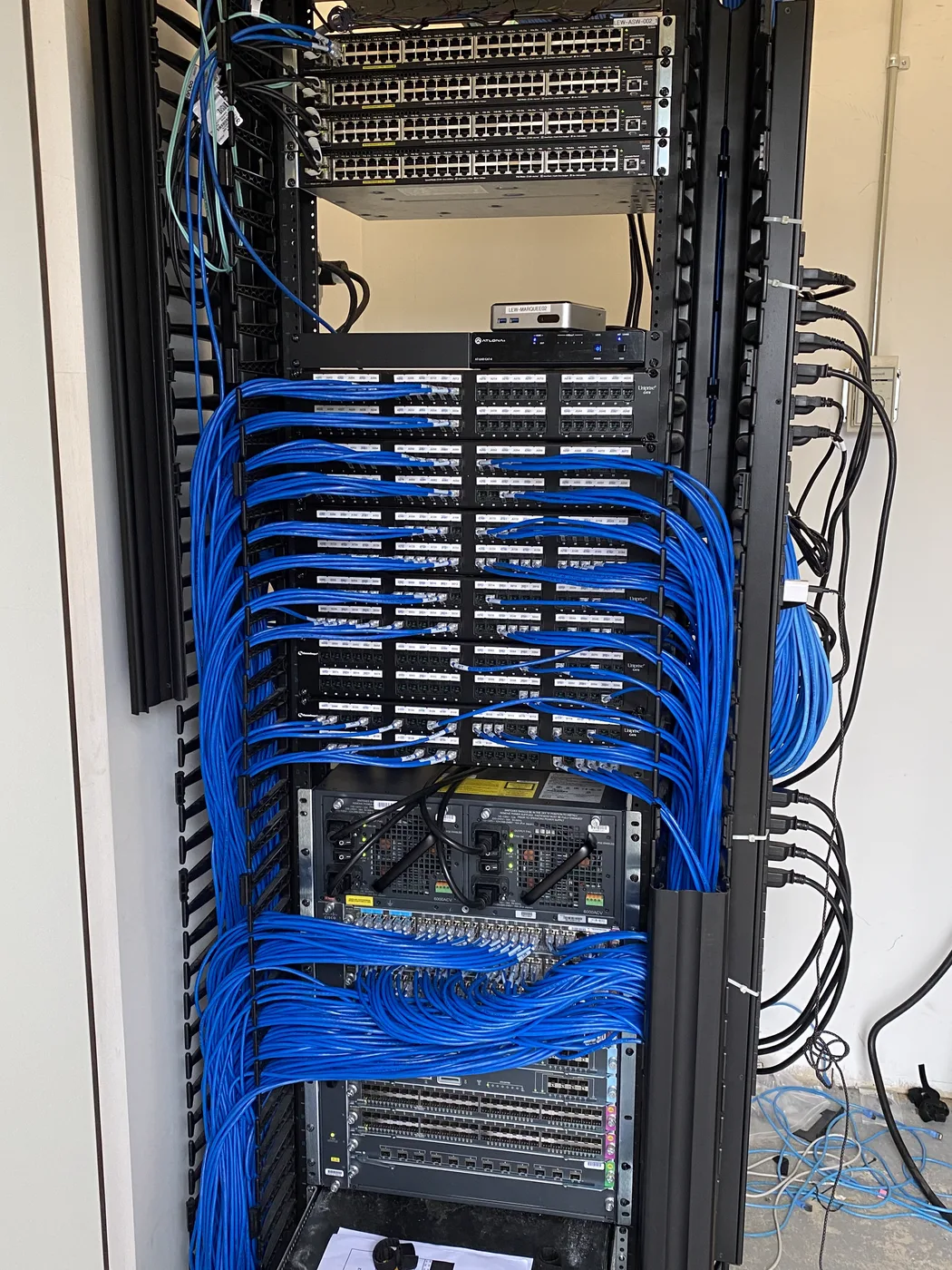 Fully dressed network rack cabling installed by Sovun Technologies