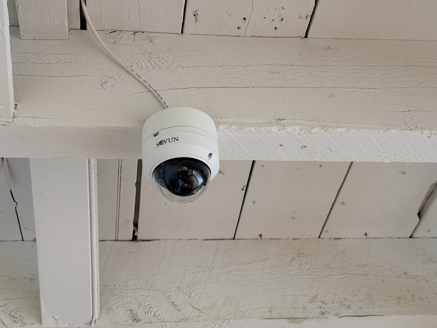 SOVUN dome security camera mounted on ceiling beams